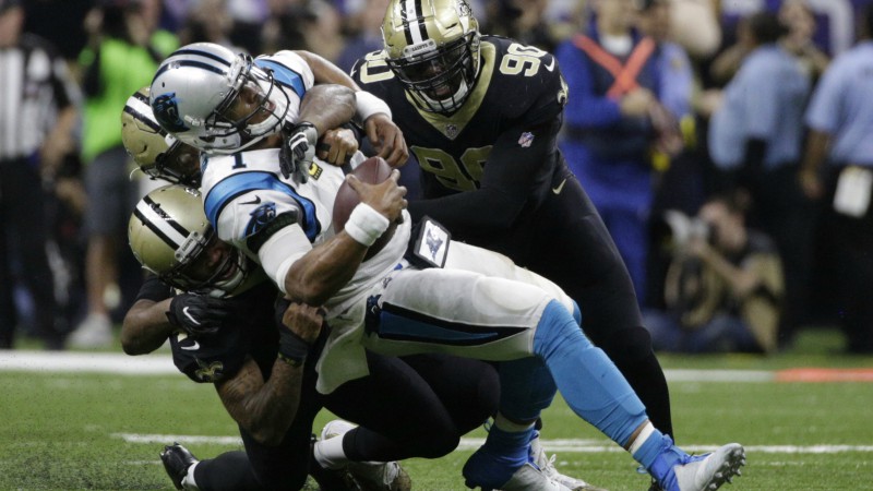 New Orleans Saints defensive end Cameron Jordan and Carolina Panthers quarterback Cam Newton