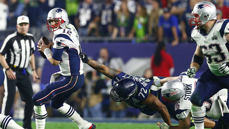 New England Patriots quarterback Tom Brady and Seattle Seahawks defensive end Michael Bennett