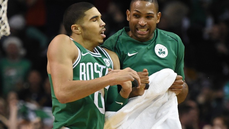 Boston Celtics forward Jayson Tatum (0) and forward Al Horford (42)