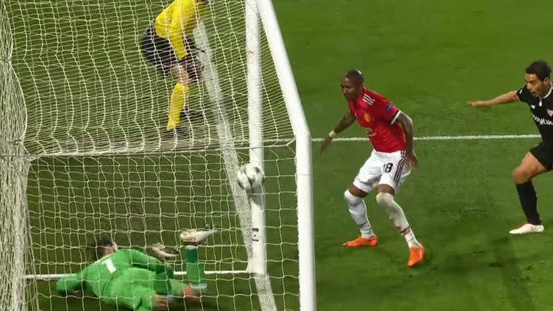 Manchester United's David de Gea and Ashley Young and Sevilla's Wissam Ben Yedder