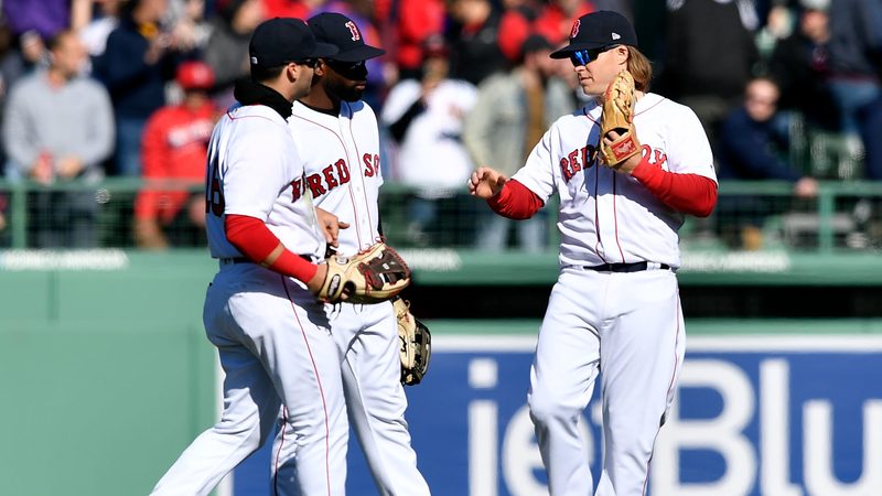 Boston Red Sox left fielder Andrew Benintendi (16), center fielder Jackie Bradley Jr. (and second baseman Brock Holt