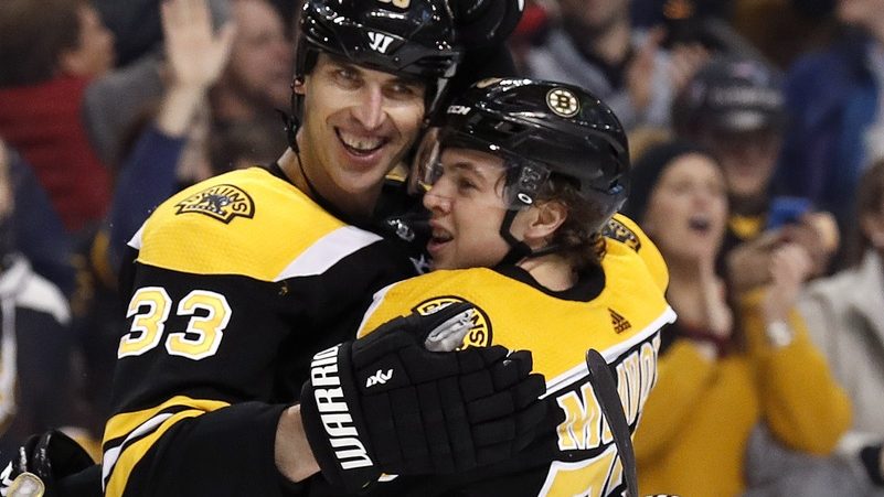 Boston Bruins defensemen Zdeno Chara and Charlie McAvoy