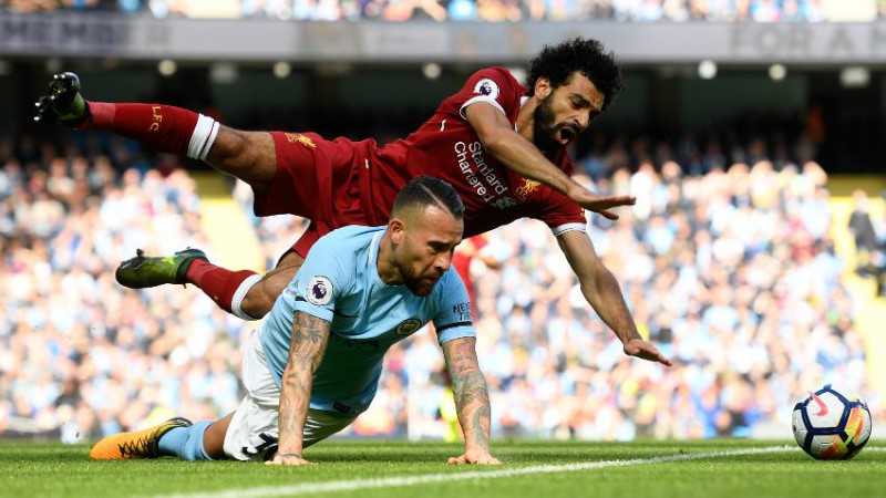 Liverpool's Mohamed Salah and Manchester City's Nicolas Otamendi
