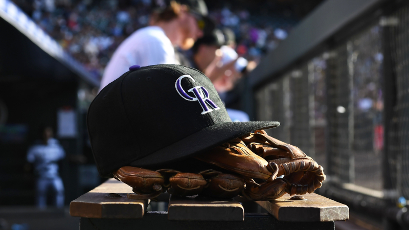 Cap and glove of a Colorado Rockies player