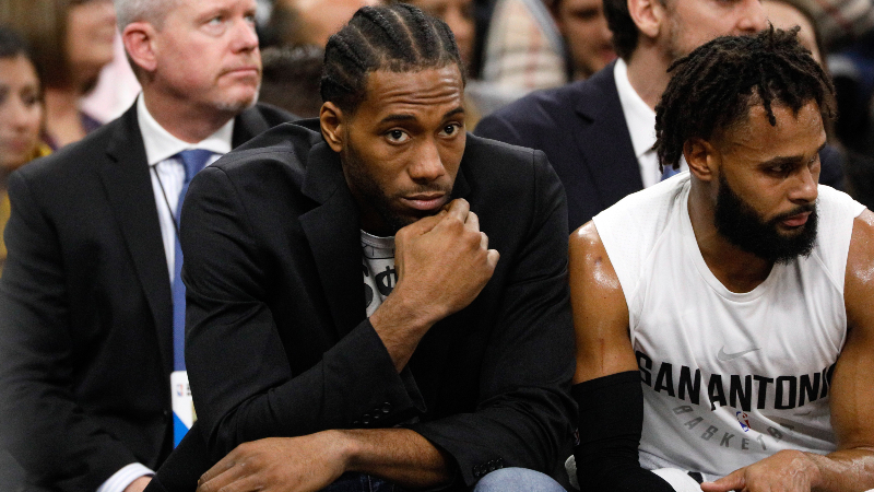 Former San Antonio Spurs small forward Kawhi Leonard (left)
