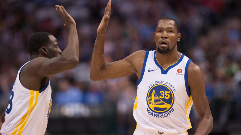 Golden State Warriors forwards Draymond Green (23) and Kevin Durant (35)