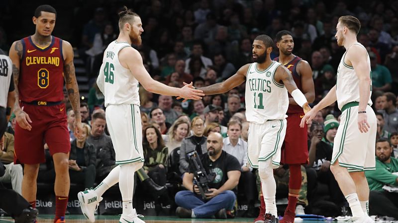 Boston Celtics guard Kyrie Irving, center Aron Baynes and forward Gordon Hayward