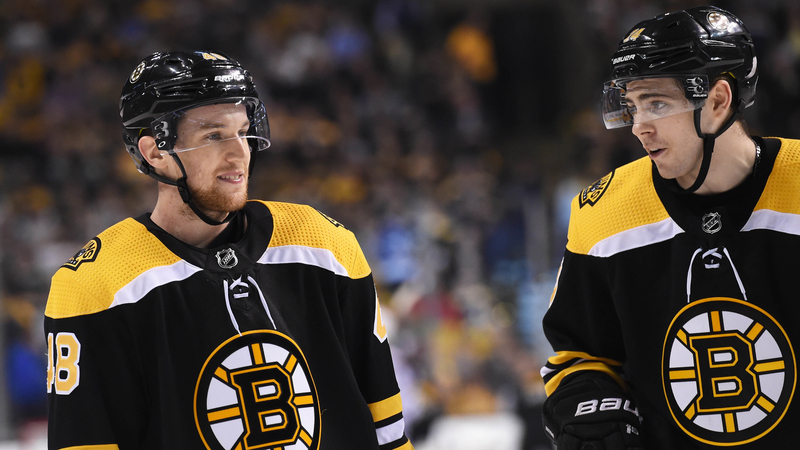 Matt Grzelcyk, Jake DeBrusk