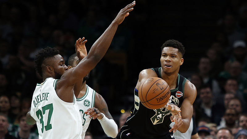 Boston Celtics guard Semi Ojeleye and Giannis Antetokounmpo