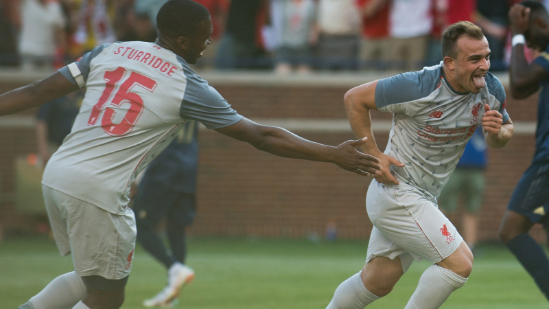 Liverpool forwards Xherdan Shaqiri (right) and Daniel Sturridge