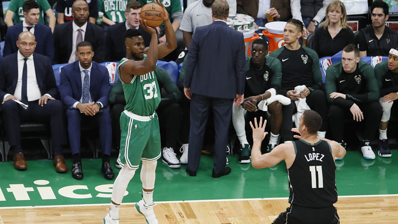 Boston Celtics forward Semi Ojeleye and Milwaukee Bucks center Brook Lopez