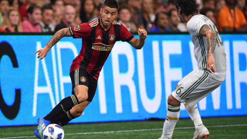 Atlanta United forward Hector Villalba (left) and Portland Timbers defender Zarek Valentin