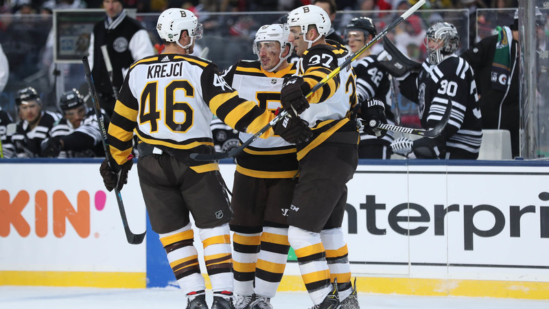 Bruins forwards Patrice Bergeron, David Krejci, Brad Marchand