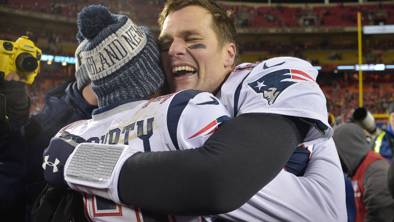 New England Patriots quarterback Tom Brady (right) and free safety Devin McCourty (left)