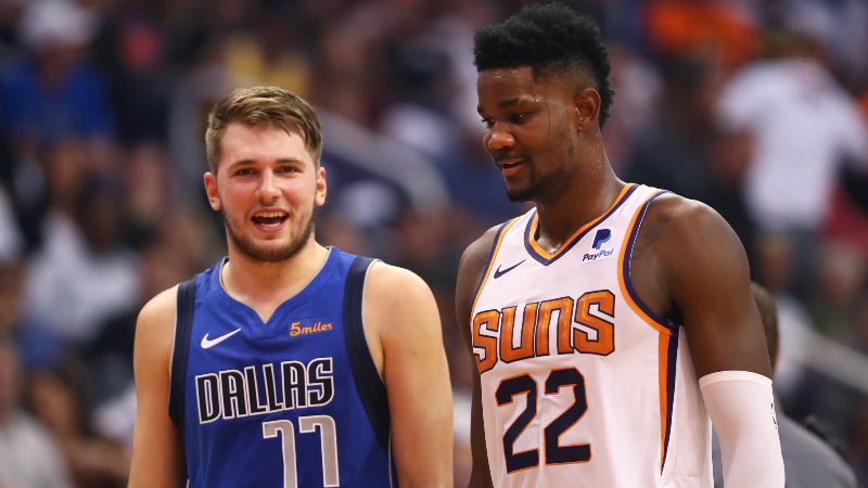 Phoenix Suns center Deandre Ayton (22) and Dallas Mavericks guard Luka Doncic (77)