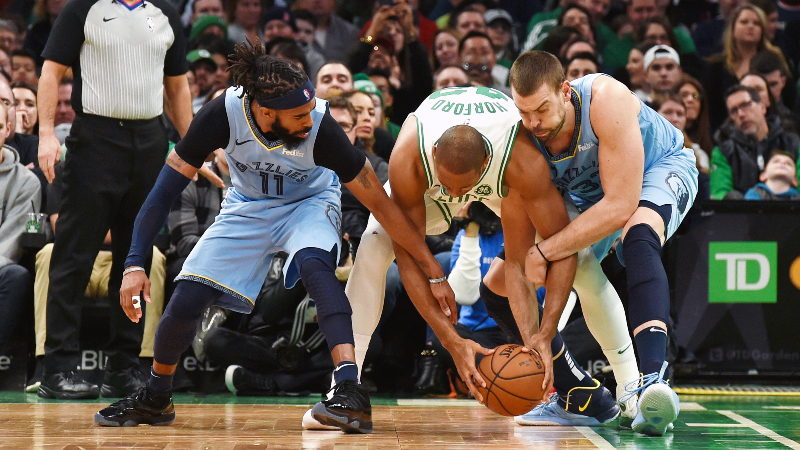 Memphis Grizzlies guard Mike Conley (left), Boston Celtics center Al Horford (center) and Memphis Grizzlies center and center Marc Gasol (right)