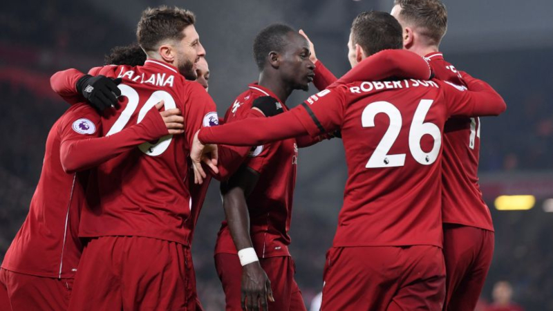 Liverpool forward Sadio Mane (center) and teammates