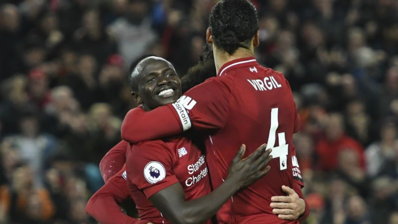 Liverpool forward Sadio Mane and defender Virgil Van Dijk (right)