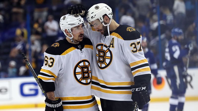 Boston Bruins forwards Brad Marchand, Patrice Bergeron