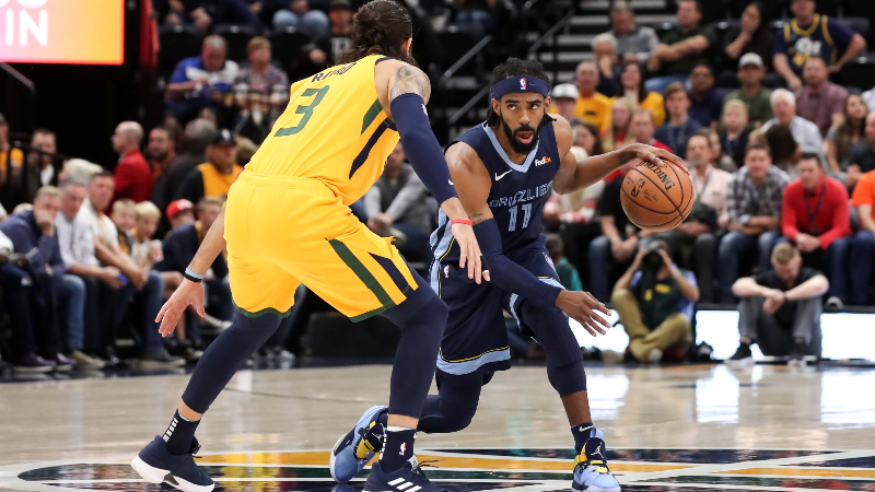 Memphis Grizzlies guard Mike Conley (11) and Utah Jazz guard Ricky Rubio