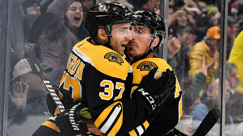 Boston Bruins players Patrice Bergeron and Brad Marchand