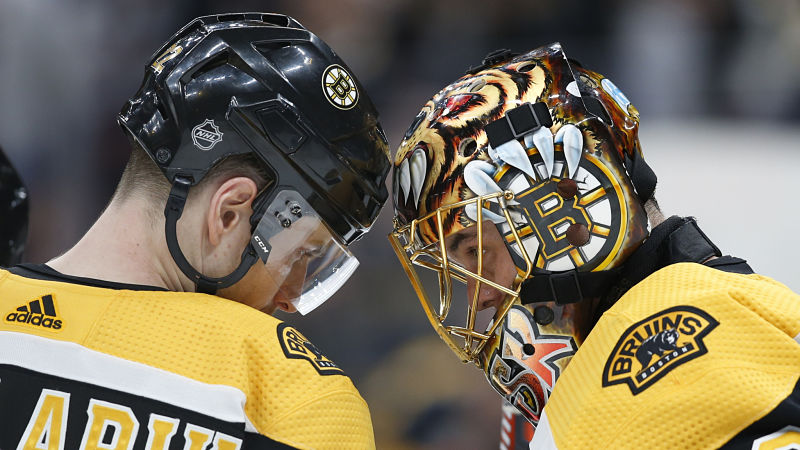 Boston Bruins forward Peter Cehlarik and goalie Tuukka Rask