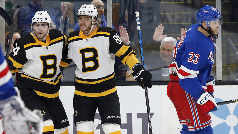 Bruins wingers David Pastrnak, Jake DeBrusk