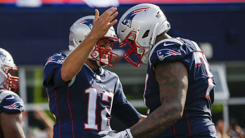 New England Patriots quarterback Tom Brady and Oakland Raiders offensive lineman Trent Brown