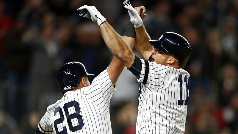 New York Yankees catcher Austin Romine and outfielder Brett Gardner