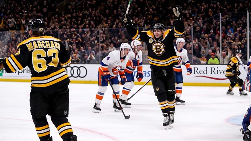 Boston Bruins forwards Brad Marchand and Jake DeBrusk
