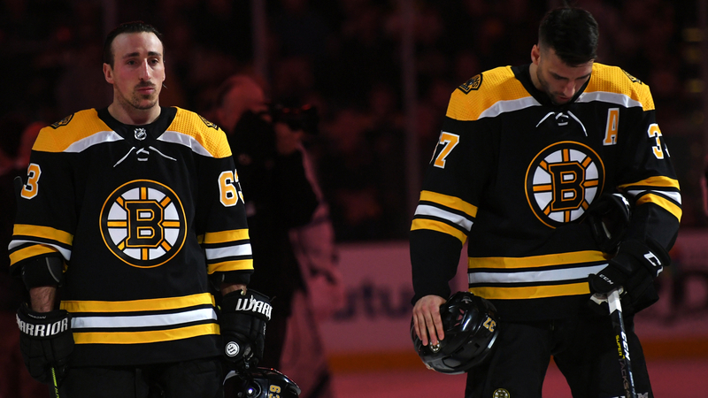 Boston Bruins' Brad Marchand and Patrice Bergeron