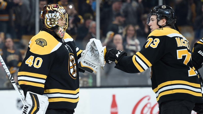 Boston Bruins defenseman Charlie McAvoy, goalie Tuukka Rask