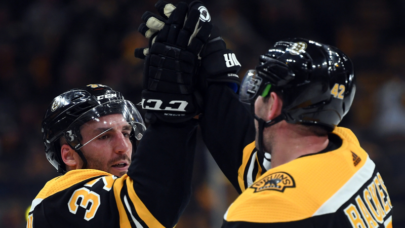 Boston Bruins' David Backes and Patrice Bergeron