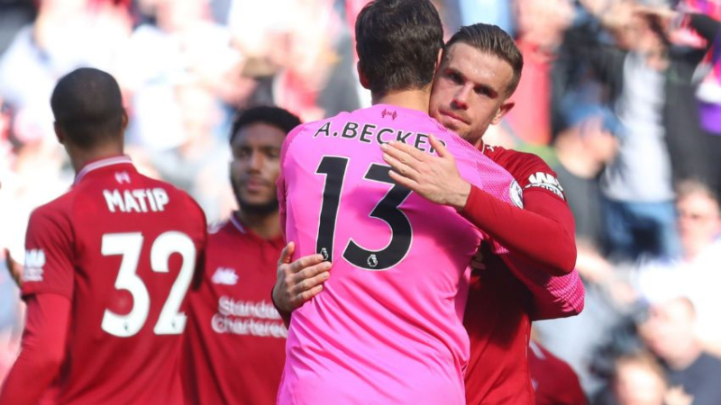Liverpool goalkeeper Alisson Becker and midfielder Jordan Henderson