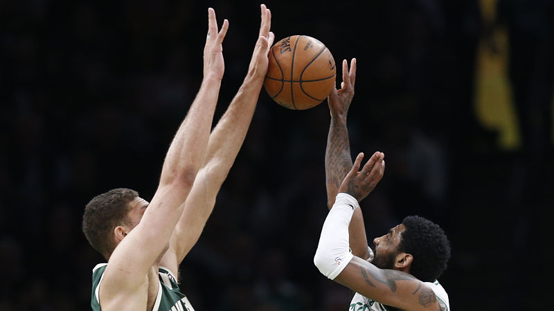 Milwaukee Bucks center Brook Lopez and Boston Celtics guard Kyrie Irving