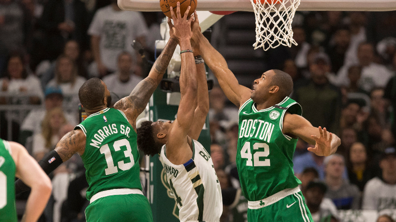 Boston Celtics forward Marcus Morris (13) and center Al Horford (42) and