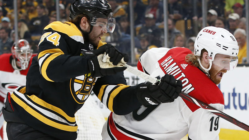 Boston Bruins winger Jake DeBrusk and Carolina Hurricanes defenseman Dougie Hamilton