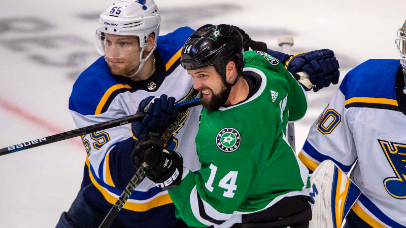 St. Louis Blues defenseman Colton Parayko (55) and Dallas Stars left wing Jamie Benn (14)