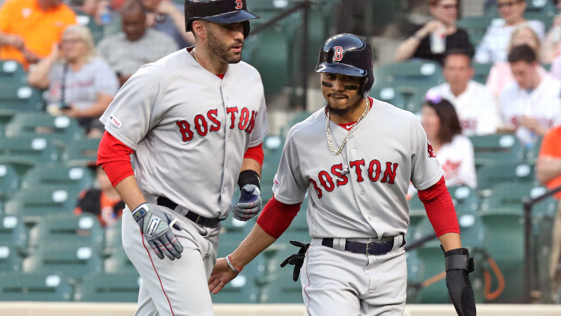Red Sox outfielders J.D. Martinez, Mookie Betts