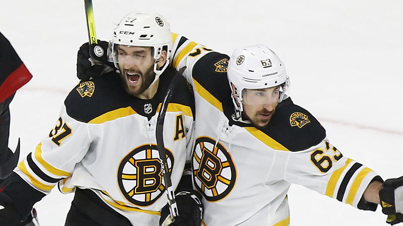 Boston Bruins Patrice Bergeron, Brad Marchand