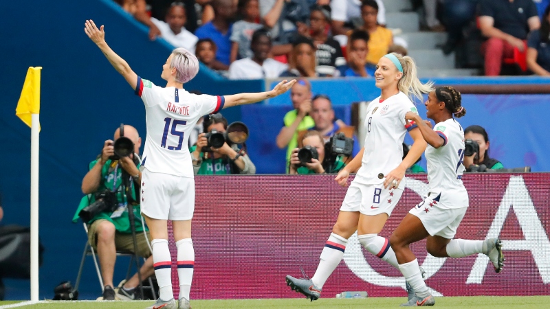 ; United States forward Megan Rapinoe (15), midfielder Julie Ertz and defender Crystal Dunn (19)
