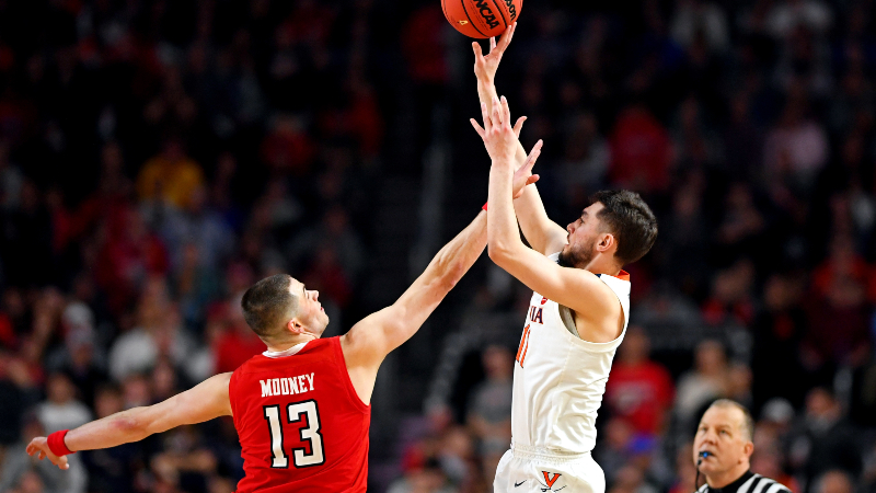 Virginia Cavaliers guard Ty Jerome (11) and Texas Tech Red Raiders guard Matt Mooney (13)