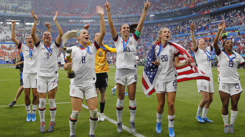 USWNT Forward Alex Morgan With Teammates