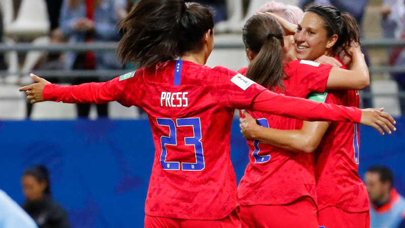 United States forward Carli Lloyd (right) and teammates Christen Press (23) and Mallory Pugh (2)