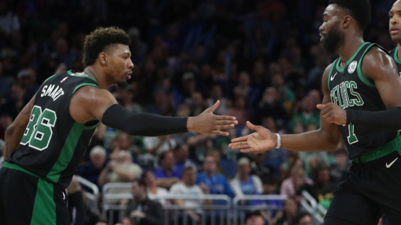 Boston Celtics forward Jaylen Brown (7) and guard Marcus Smart (36)