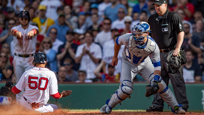 Boston Red Sox right fielder Mookie Betts and Toronto Blue Jays catcher Luke Maile