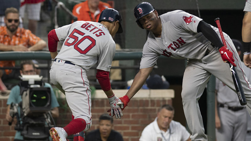 Boston Red Sox outfielder Mookie Betts and third baseman Rafael Devers