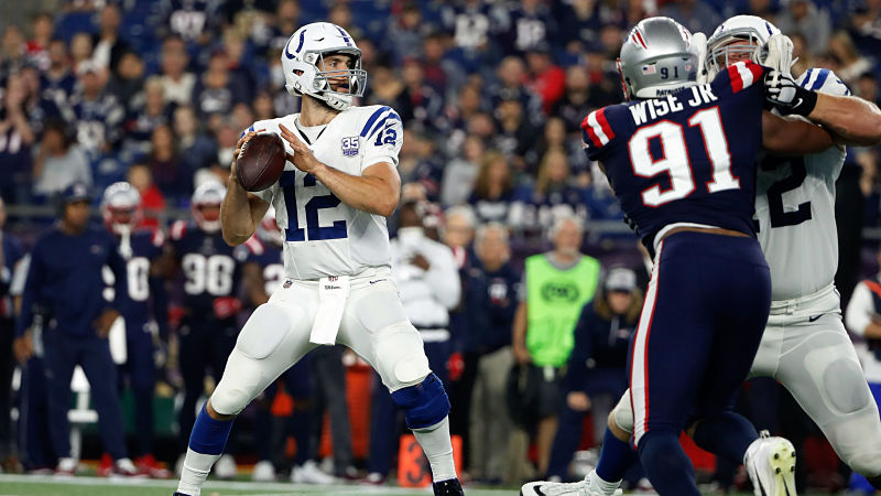 Andrew Luck and New England Patriots defensive lineman Deatrich Wise Jr.