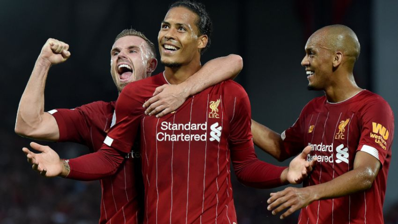 Liverpool's Jordan Henderson (left), Virgil van Dijk (center) and Fabinho