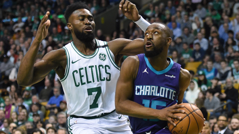 Boston Celtics guards Jaylen Brown (left) and Kemba Walker